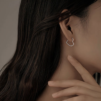 Boucles d'oreilles en cœur doré en acier inoxydable