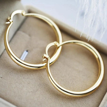 Boucles d'oreilles en or à fort impact