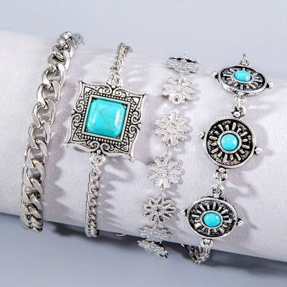 Ensemble de Bracelets Dorés Superposés aux Pierres Ciel